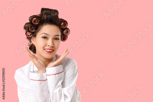 Female Asian chef with hair...
