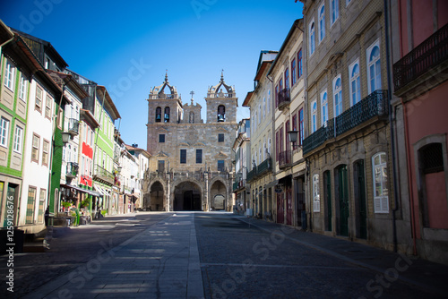 Wallpaper Mural A quiet street with colorful buildings leading to the Braga Cathedral, Portugal. Torontodigital.ca