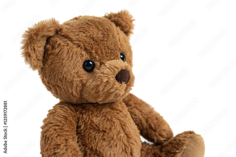 Obraz premium A fuzzy brown teddy bear with black eyes and a brown nose, sitting against a white background. Perfect for children's designs, toy-related projects, or plush bear themes.