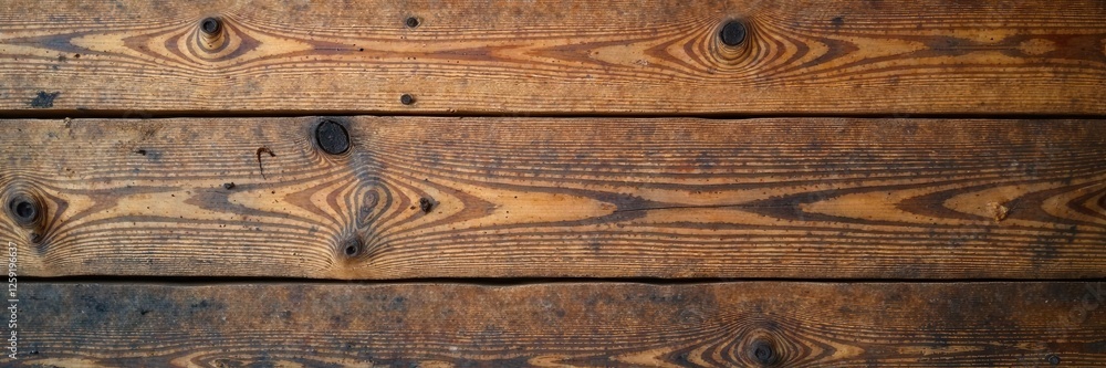 Naklejka premium Wooden Plank Wall with Abstract Pattern in Earth Tones, geometric design, natural art, wood plank wall