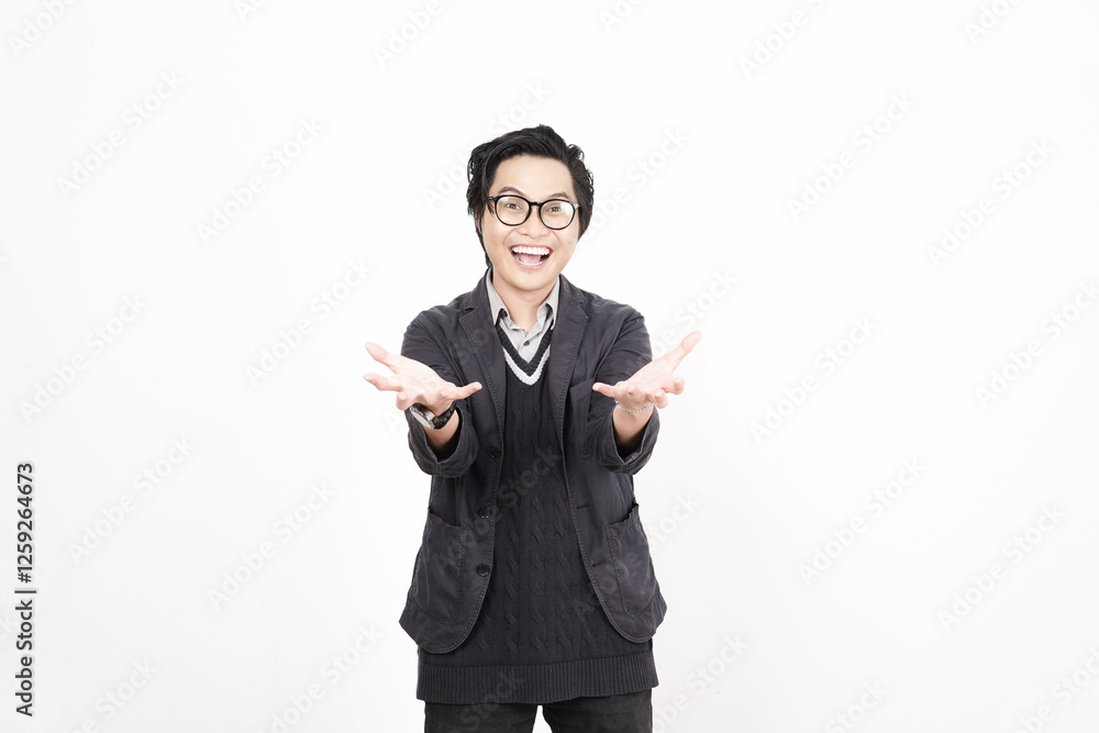 Smiling and open hands Of Handsome Asian Man Isolated On White Background Smiling and open hands Of Handsome Asian Man Isolated On White Background