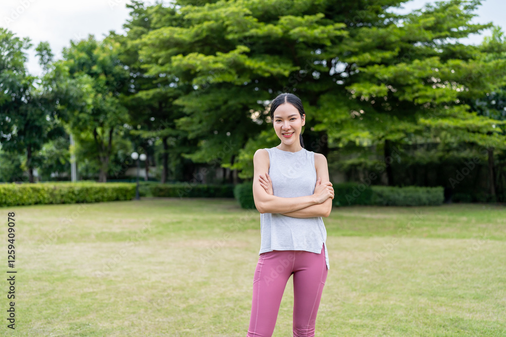 Fototapeta premium Portrait of Asian beautiful woman exercise outdoors park in morning. 