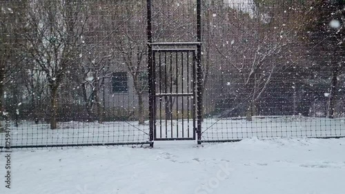 Scenery of a quiet park on a heavy snowfall day