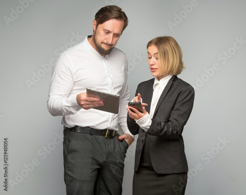 professional people businessmen lawyers discuss plan use tablet smartphone. colleagues subordinate and boss discuss decide study . businessmen businesswoman in business clothes use photo