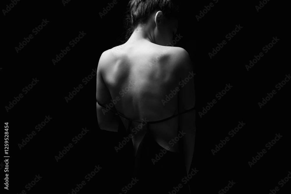 Naklejka premium Black and white Woman silhouette. Beautiful Naked Back Girl