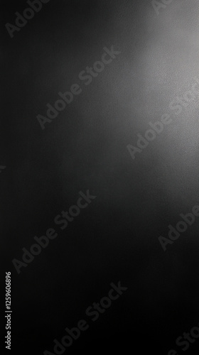 smooth, dark surface with subtle gradients and minimalistic design creates modern and elegant backdrop. Ideal for various creative projects