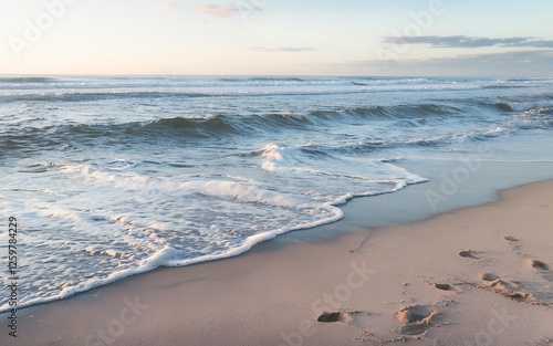Wallpaper Mural Serene Coastal Scene Soft Waves on Sandy Beach at Sunrise Torontodigital.ca