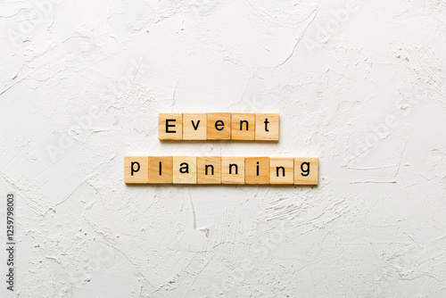 Event planning word written on wood block. Event planning text on table, concept photo