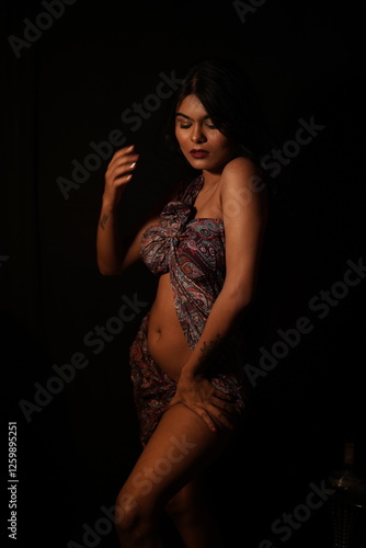 Wallpaper Mural Elegant Woman in Sensual Pose Under Warm Moody Lighting Torontodigital.ca