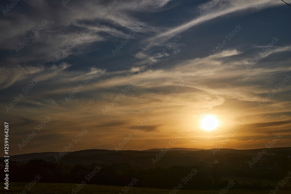 Sunset on a natural landscape. Beautiful clouds Sunset on a natural landscape. Beautiful clouds
