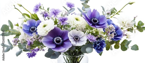 Elegant floral arrangement featuring vibrant purple and white anemones, delicate blue cornflowers, and lush greenery in a clear glass vase.