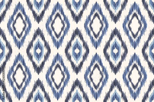 Ethnic ikat seamless pattern.beautiful pattern. floral embroidery, bohemian style, abstract flower art print. ethnic ikat abstract art. seamless fabric. ikat design for fabric, wallpaper, clothing.	