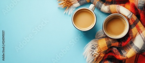 Wallpaper Mural Cozy flat lay featuring two mugs of coffee on a light blue background with a warm plaid in autumn colors positioned alongside the cups. Torontodigital.ca