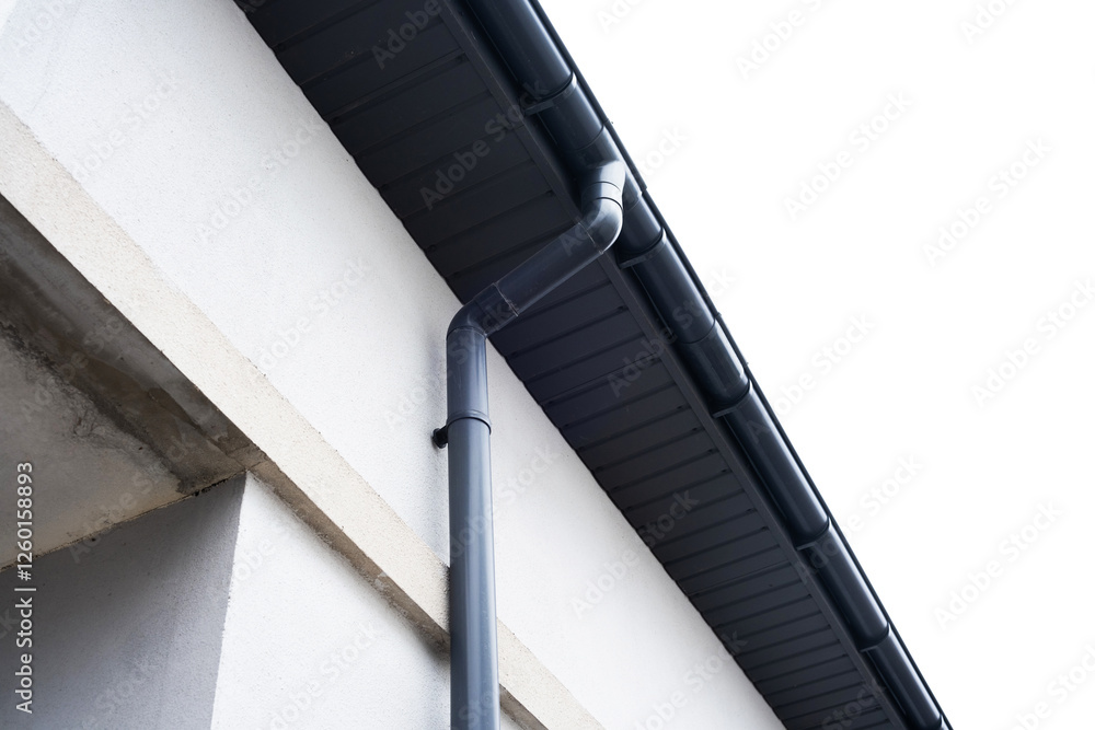Naklejka premium Gutter and downspout system visible on a modern building exterior
