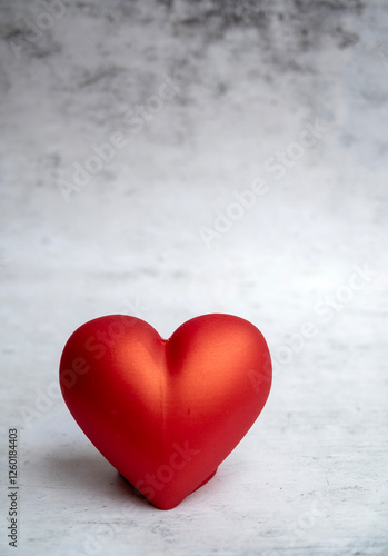 Big red heart on a gray textured background