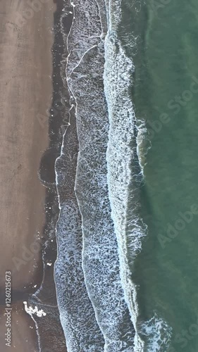 Waves rolling onto the beach