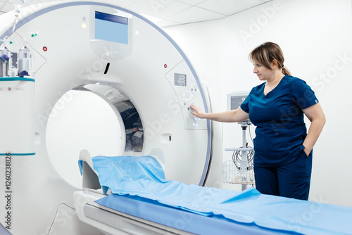Foto A medical nurse, doctor operates a modern MRI scanner while attending to a patient in a medical facility