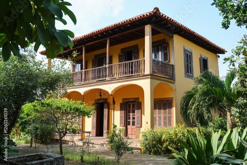 Wallpaper Mural Charming yellow colonial-style house Torontodigital.ca