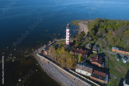 View of the old Shepelevo lighthouse on a May day (aerial survey). Leningrad region, Russia photo