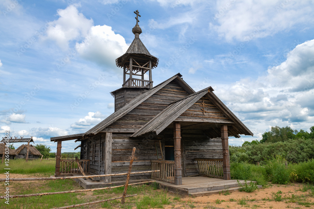 Fototapeta premium Old wooden church. Film set in the Loskovitsy (Loskovskoye) tract. Pskov region, Russia