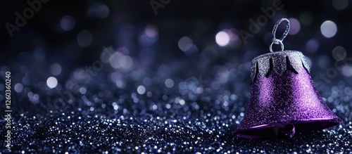 Purple Christmas bell on black glitter background with selective focus emphasizing festive decor and space for text or holiday themes