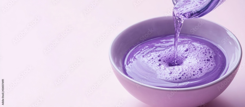 Purple shampoo being poured into a bowl for salon use with smooth texture and blank space for branding or informative text Purple shampoo being poured into a bowl for salon use with smooth texture and blank space for branding or informative text