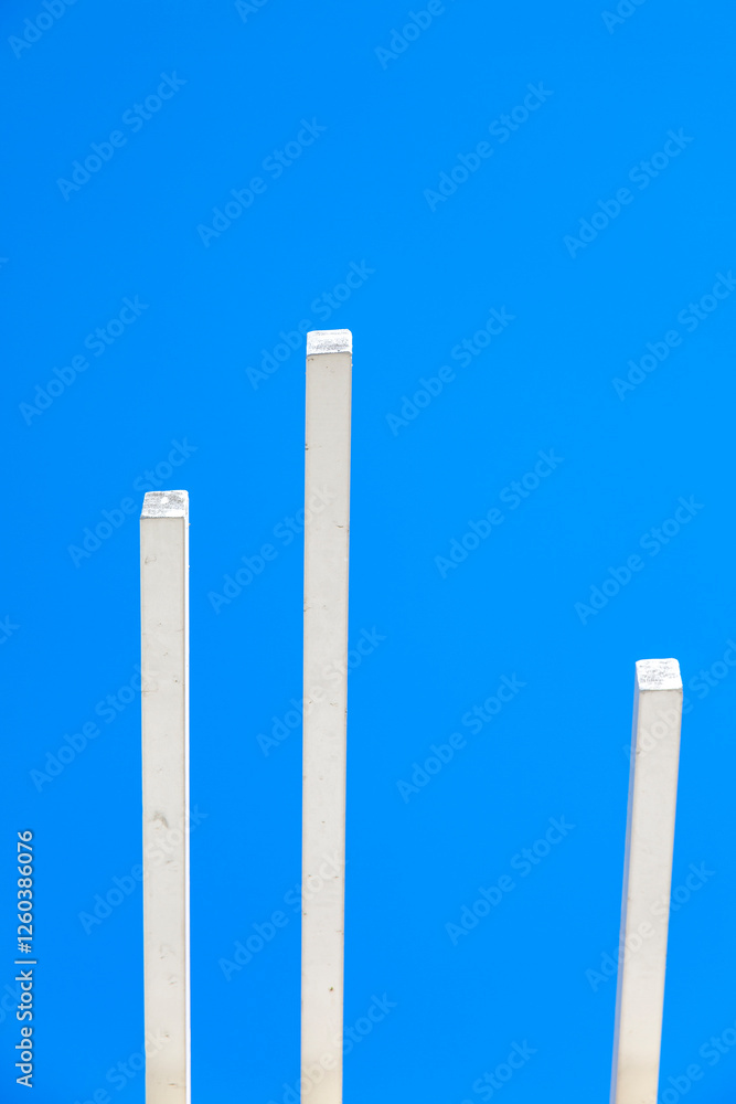 white concrete beam infrastructure under construction isolated in front of blue summer sky