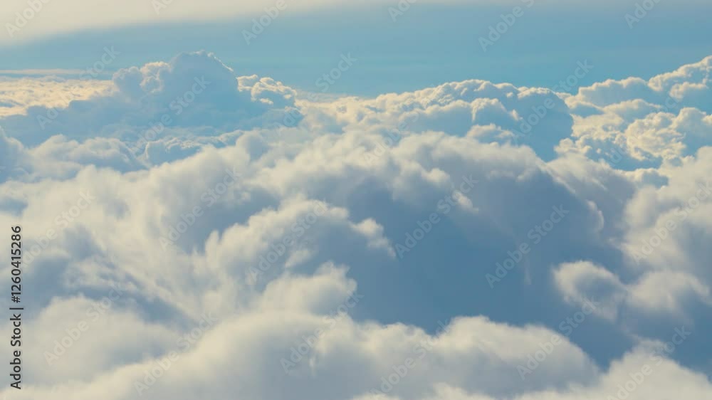 Explore the serene beauty of majestic clouds floating through a clear blue sky at sunset Explore the serene beauty of majestic clouds floating through a clear blue sky at sunset