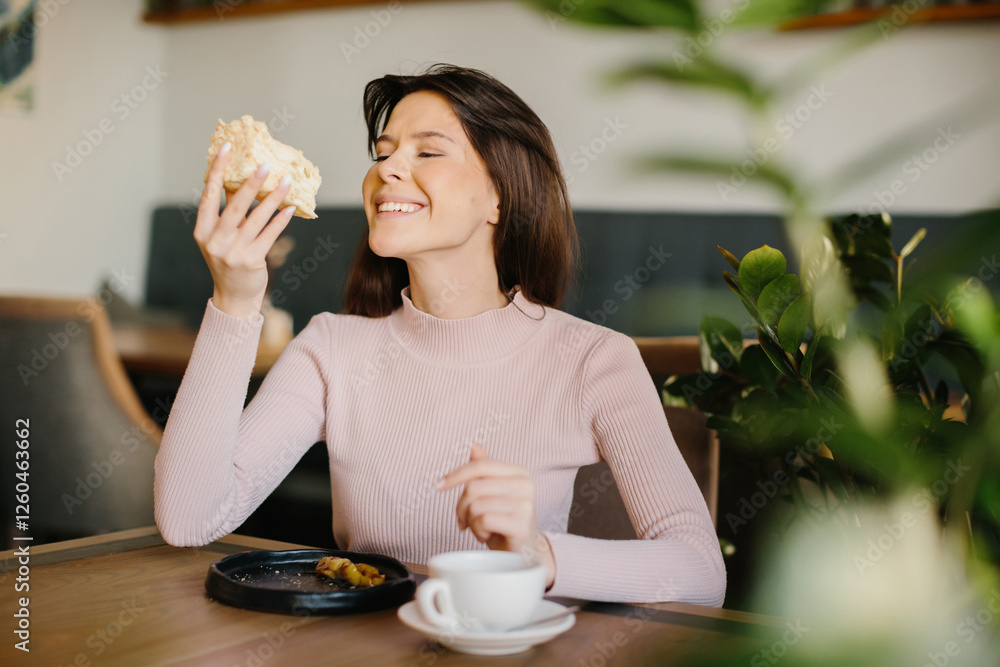 Woman Enjoying Pastry and Coffee in a Cozy Cafe Environment Woman Enjoying Pastry and Coffee in a Cozy Cafe Environment