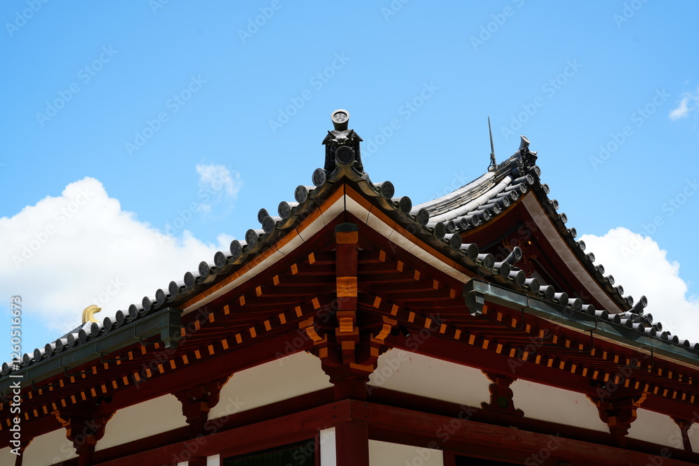 Traditional Japanese Temple Roof Against Clear Blue Sky Traditional Japanese Temple Roof Against Clear Blue Sky