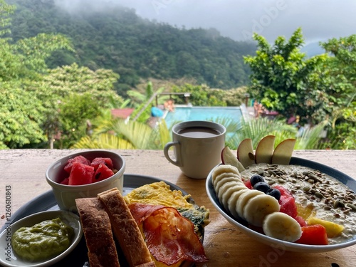 Delicious breakfast at jungle retreat with infinity pool, Minca, Colombia.