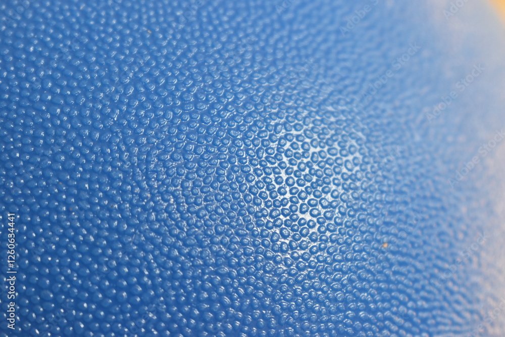 Obraz premium Close up of textured blue surface with bumpy pattern and soft lighting open copyspace
