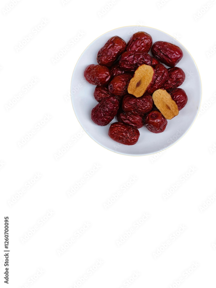 dried dates in a white plate on white background dried dates in a white plate on white background