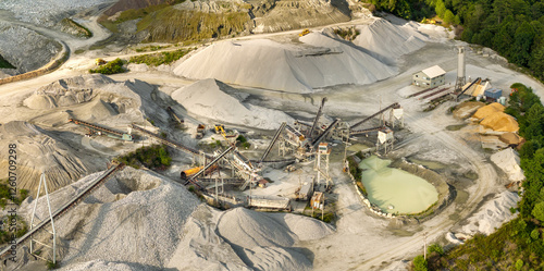 Sand open-pit mining quarry with processing plant for crushed stone. Extracting of natural resources for construction industry