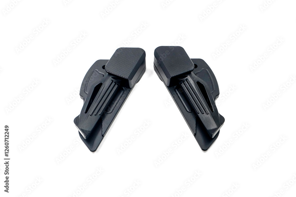 pair of motorcycle footstep parts isolated on white background, motorcycle foot peg, closed position pair of motorcycle footstep parts isolated on white background, motorcycle foot peg, closed position