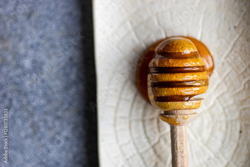 Honey on a honey siphon photo