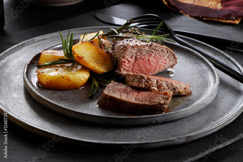Roast beef steak with rosemary potatoes