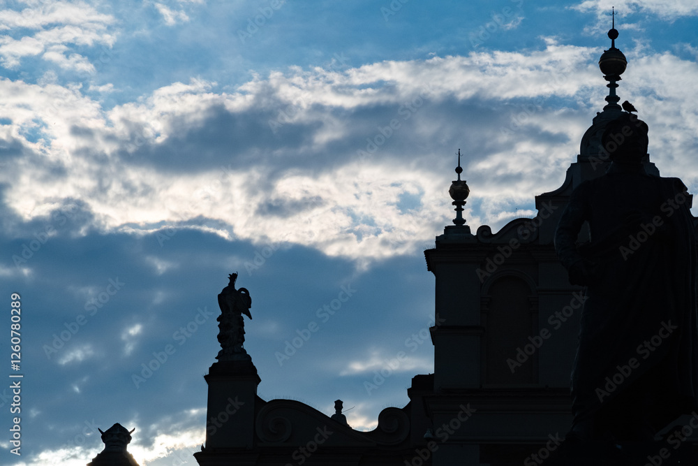 A captivating silhouette of a tall building against a cloudy sky A captivating silhouette of a tall building against a cloudy sky