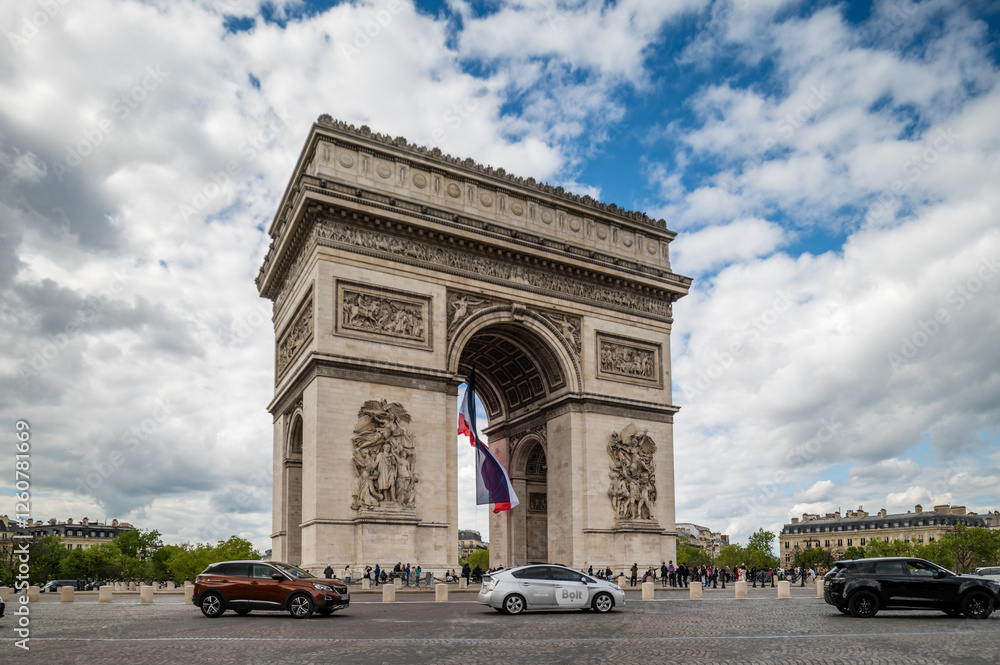 Paris Arc de Triomphe (Triumphal Arch) in Paris in a summer day Paris Arc de Triomphe (Triumphal Arch) in Paris in a summer day