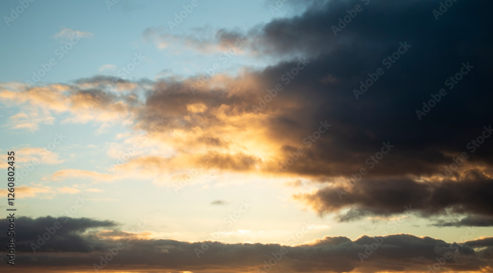 Fototapeta premium Colored Clouds at Sunset near the Sea