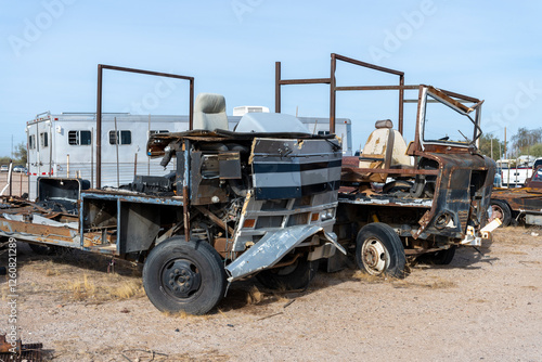 Bilde på lerret Two recreational vehicles in a scrapyard