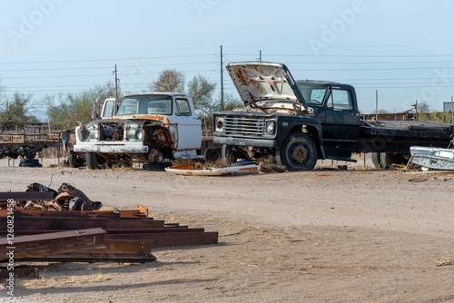 Принти на полотні Two old trucks in an Arizona scrapyard