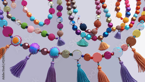 Colorful handmade bead necklaces with tassels arranged on a white surface for a fashion jewelry concept flat lay with space for text
