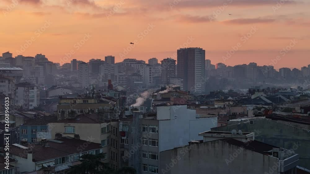 Aerial: sunset presents a mix of modern skyscrapers, residential rooftops Aerial: sunset presents a mix of modern skyscrapers, residential rooftops