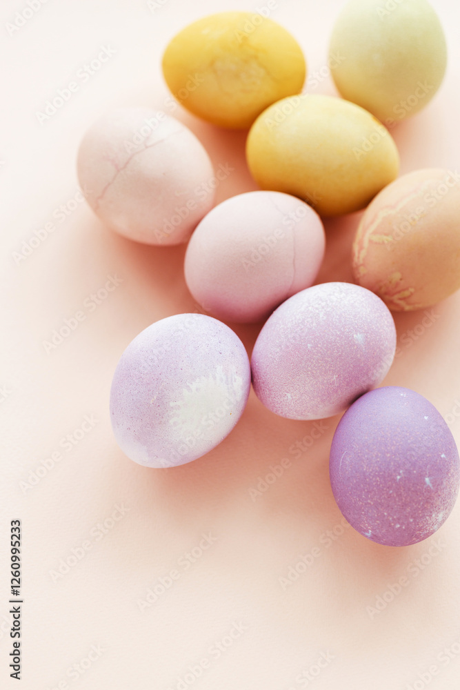 Natural dying Easter eggs on peach background. Easter greeting card. Natural dying Easter eggs on peach background. Easter greeting card.