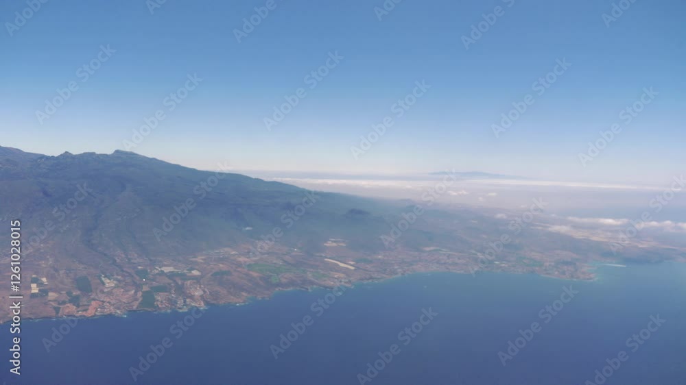 Captivating Aerial View of Tenerife Island, Spain from a Soaring Airplane in 4k Captivating Aerial View of Tenerife Island, Spain from a Soaring Airplane in 4k