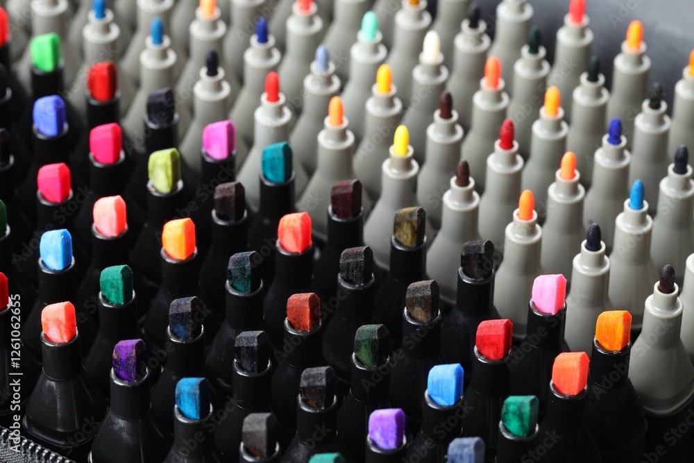 Fototapeta premium Many colorful markers in bag, closeup. Art supplies