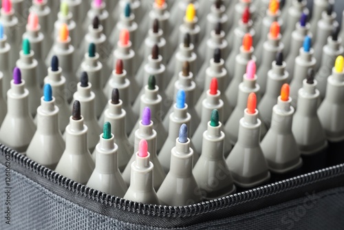 Photos Many colorful markers in bag, closeup. Art supplies