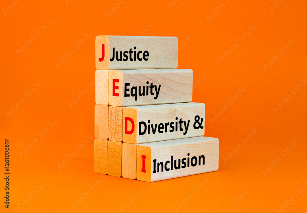 Naklejka premium Justice equity diversity inclusion symbol. Concept words JEDI Justice Equity Diversity Inclusion on blocks. Beautiful orange background. Business justice equity diversity inclusion concept. Copy space
