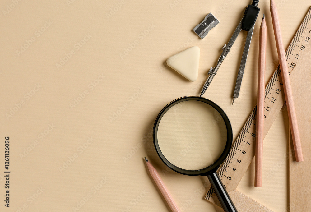 Flat lay composition with ruler and other stationery on beige background, space for text Flat lay composition with ruler and other stationery on beige background, space for text